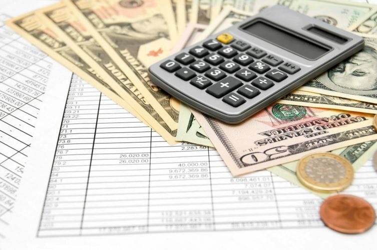 Calculator and money on the documents